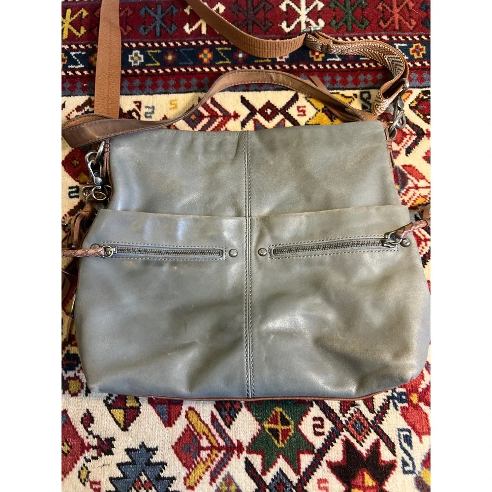 The Sak Slate Gray Leather Hobo Crossbody Bag with Chevron Guitar Strap